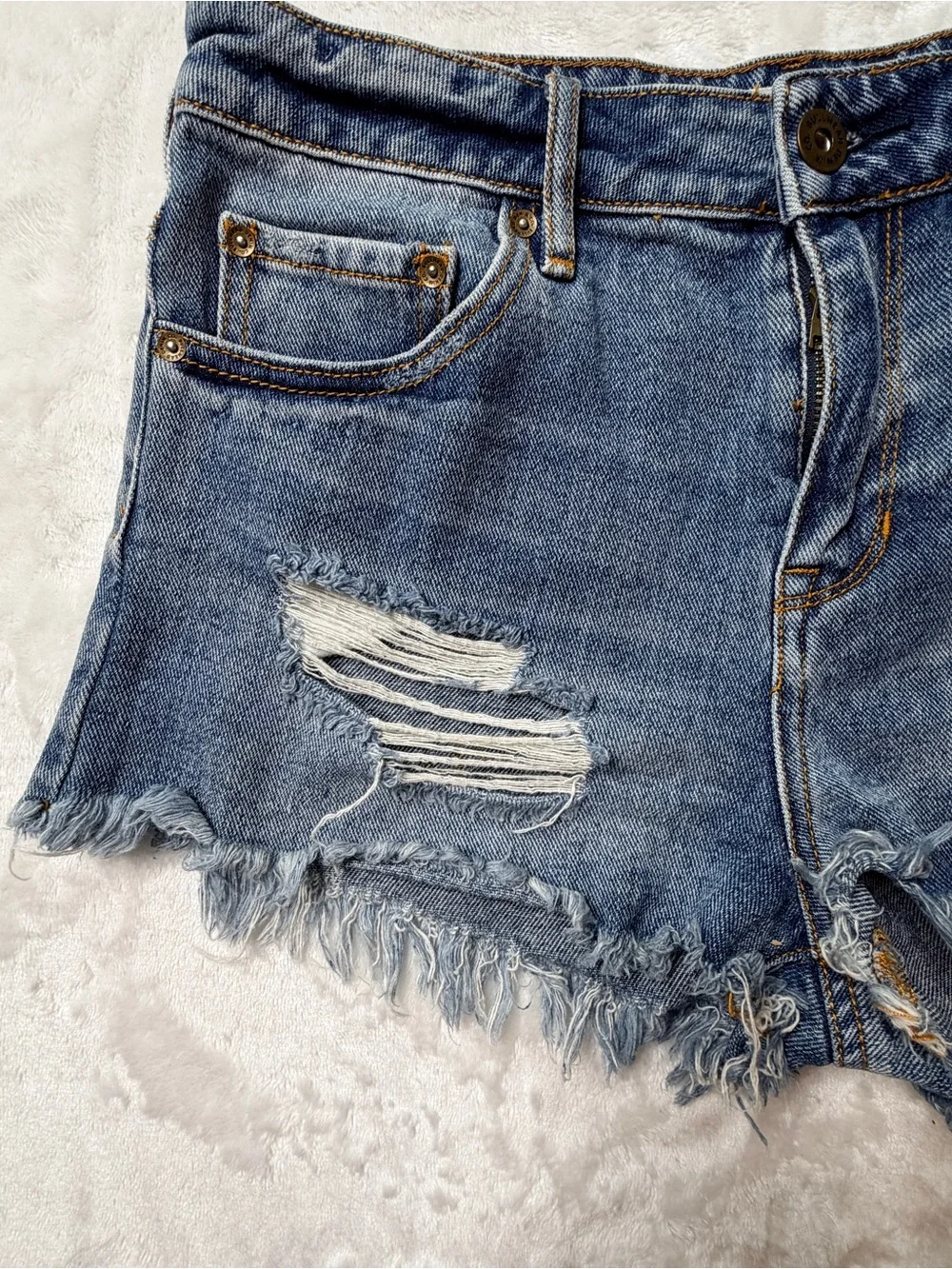 BullHead denim Co. Women's Distressed Blue Denim cutoff  mid/high rise Shorts.